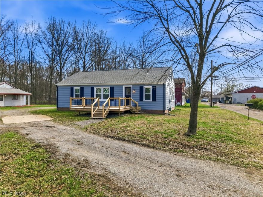If you are looking for an affordable, move-in-ready ranch-style home, this is it! Situated on over half an acre, this property features a circular driveway and extensive updates throughout. The main floor boasts fresh paint on the ceilings, walls, and trim, along with all-new flooring and light fixtures. The updated kitchen includes hickory cabinets, recessed lighting, and new flooring. It opens into a dining room with a full-size closet and a large living room featuring a decorative fireplace. This level also includes two bedrooms and a full bathroom. The basement offers significant potential for a recreation room or additional living space. It currently features a laundry area with a large sink, a second full bathroom and a decorative fireplace. Recent updates include: 2025: New Deck and New Carpet.  2023: New Roof, Windows, and blown-in attic insulation.  2020/2021: Full Kitchen remodel, structural updates to create an open-concept dining and living area, complete home rewiring, new basement steps and outlets, and new gas lines for the stove and dryer.  Must see to appreciate; schedule your tour today!
