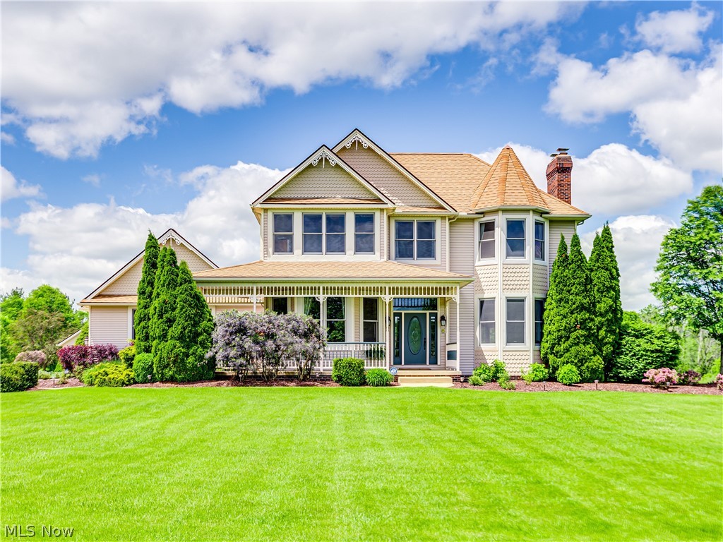This stunning home is nestled on 2.54 acres & has been lovingly remodeled throughout! A wrap around porch welcomes you into this spacious floor plan featuring *10ft ceilings, oversized doorways & refinished hardwood floors! The well appointed main level includes a spacious foyer, large living room w/fireplace & bayed windows, dining room, laundry & powder room. The gourmet kitchen is an entertainers dream w/ Fivestar commercial gas stove w/ 6 burners, griddle, double ovens & vented hood! Other features include leathered granite counters & sink, center island w/additional oven & wall to wall pantry storage! A butlers station is located just off the kitchen w/wine fridge & storage. Also located off the kitchen is an impressive sun filled dining space w/ access to the deck! The hardwood floors continue on the second level which includes 2 large bedrooms that share an updated bathroom & spacious master retreat w/updated en suite & large double closets! Lower level adds an additional 1,000