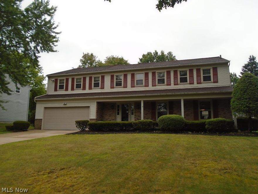 Totally redone 4 to 5 bedroom home with 2 master suites. Refinished hardwood floors in living room, dining room, family room. Kitchen with newer appliances, backsplash, laminate floors, updated windows, central air, hot water tank, oversized master and huge walk-in closet. Master bath with newer cabinets, granite tops, and floors. 5th bedroom is now 2nd floor laundry. Could be converted back to 5th bedroom. Exclude refrigerator.