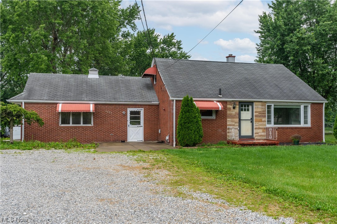 **Back on market at no fault of seller.**
Check out this 3 bed/2 bath brick bungalow in the Louisville School District. Situated back off the road on a 3/4 acre lot; the home features an oversized 2-car, side entry garage that connects to a spacious screened-in back porch overlooking a private tree-filled backyard. A truly peaceful setting perfect for relaxing in the warmer weather. Newer windows throughout, this home has a bright, cheerful living room with crown molding. Cozy kitchen with all appliances and eat-in space. First floor living with master bedroom and full bath w/ updated tub/shower surround. Upstairs is a spacious bedroom with built-ins, cedar closet and additional storage. Partially finished basement includes a full bath. Well & Septic inspections completed on 7/5/23 with Acceptable Stark County Certificate included.