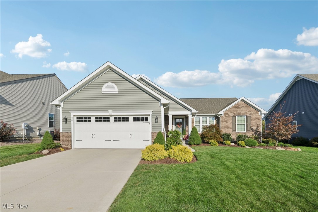 Welcome to this elegant ranch, located in the desirable Woodland Villas, close to the Naturealm, shopping, restaurants, and other cultural activities! Offering convenient one-floor living, this residence combines thoughtful design with modern updates, creating the perfect blend of comfort and style.
The inviting entryway features a drop station, leading into a spacious dining room highlighted by a large window.
Entertain in the living room, filled with natural light, showcasing multiple windows, a ceiling fan, and a cozy gas fireplace.
Prepare culinary delights in the kitchen, presenting extensive cabinetry, a pantry cabinet, granite countertops, a center island/breakfast bar, stainless steel appliances, and a touchless faucet. The adjoining eating area offers direct access to the patio.
Retreat to the owner’s suite, featuring crown molding, a walk-in closet, and an ensuite bathroom with double sinks.
Two additional, generous-sized bedrooms, a full bathroom, and laundry room with Kraftmaid cabinetry complete the main level.
The finished basement provides 868 square feet of additional living space, including a large family room, full bathroom, and ample storage.
Unwind on the stamped concrete patio, where professional landscaping and privacy plantings overlook the .25-acre greenspace—an ideal spot for relaxing or entertaining!
An attached, 2-car garage boasts storage cabinets and a pull-down ladder to additional storage space.
Additional highlights include new interior and exterior light fixtures, hidden electrical wiring for TV’s, custom drapery, blinds in every window, and so much more - ensuring a move-in ready experience!
This home is located in Cuyahoga Falls, with Cuyahoga Falls utilities and Cuyahgoa Falls rates/privileges for all Cuyahoga Falls amenities!
With its thoughtful layout, stylish finishes, and serene outdoor living spaces, this Woodland Villas home is a rare opportunity not to be missed.