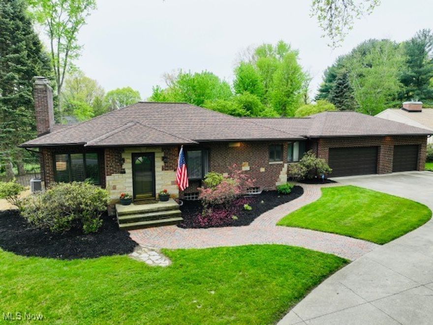 Timeless Brick Ranch in Charming Fairlawn Heights! This beautifully maintained 2–3 bedroom, 3 bath brick Ranch offers a flexible floor plan for modern living. Step into a welcoming foyer that leads into an open, sunlit family room with a cozy fireplace, seamlessly flowing into the updated kitchen, perfect for entertaining. The main level features an owner’s suite, an additional bedroom, full bath, and a spacious mud/laundry room/breezeway with extra storage. Over 600 sq ft of finished living space in the lower level, complete with rec room, a second fireplace, potential 3rd bedroom, and full bath. Outside, escape a beautifully landscaped lot complete with a fully fenced backyard with wrought iron fencing, a flat lawn, deck, & gravel patio. The 3-car garage offers ample space for storage or a workshop, plus a convenient circular driveway. Recent updates include new HVAC (2023), backyard patio, fresh landscaping, new blinds, and painted basement. 8x12 cottage-style shed. Laundry hookups are available on both levels. A rare opportunity in a sought-after neighborhood; don’t miss it!