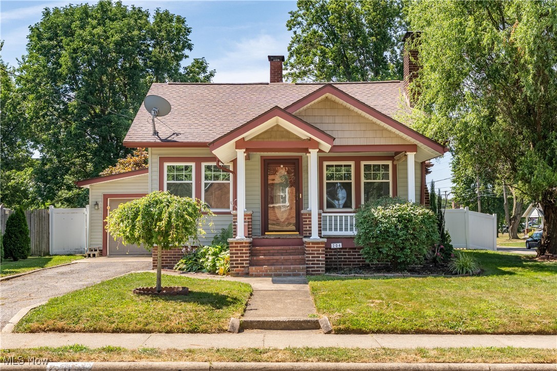 This beautifully maintained home is perfectly situated in a prime North Canton neighborhood—just a short walk to Hoover High School and Middle School, Dogwood Park and Pool, the public library, and close to shopping and restaurants. Enjoy the charm of a sidewalked street and a welcoming covered front porch. Step inside to a spacious living room with a cozy gas fireplace and luxury vinyl plank (LVP) flooring installed in 2020. The updated kitchen features stainless steel appliances and blends modern convenience with classic charm. A remodeled full bath (2016) boasts tile flooring and a tile bath surround. The home offers a rare combination of garage space with both a 1-car attached and a 2-car extra deep garage—perfect for multiple vehicles, hobbies, or storage. The fully fenced-in backyard provides privacy and is ideal for kids, pets, and outdoor gatherings. The primary suite offers a private deck walk-out to the backyard patio for quiet mornings or evening relaxation. Major updates include: New roof with 25-year transferable warranty (2018), New electric panel (2023), New water heater and garbage disposal (2019),updated windows, furnace, A/C, and siding with added insulation (2012), Basement with durable epoxy-coated flooring and a finished recreation room This move-in-ready home blends comfort, function, and location—everything you've been looking for in North Canton!