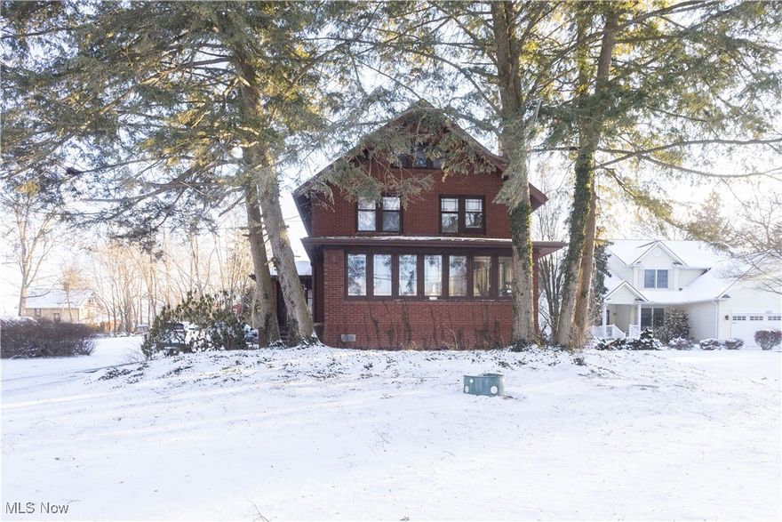 Welcome home to this 3 bedroom 1 1/2 bath all brick home with 1538 square foot. This home is loaded with great woodwork and charm and 9 ft ceilings. This home has a lot of space for all of the items you are bringing with you. The first floor has a large living room with a gas log fireplace and mantle and built ins for all of the decor for each season. The heated enclosed front porch offers you a great view of the lake across the street. The dining room is spacious for all of your guests. The kitchen has a breakfast nook and also a 1/2 off of it for your convenience. The 2nd floor has the 3 bedrooms with nice sized closets and also the full bathroom. Don't forget the double linen closet as well. The deep oversize 2 1/2 car garage insulated and with a loft offers you a ton of space for your vehicles and your toys and any other needs. The garage was built in 2006.The septic 2022, carpet 2021 and paint 2021, furnace and AC 2021 with transferable warranty for 10 years, HWT approximately 3-4 years old, not sure about the age of the roof. Contact your favorite agent for a showing.