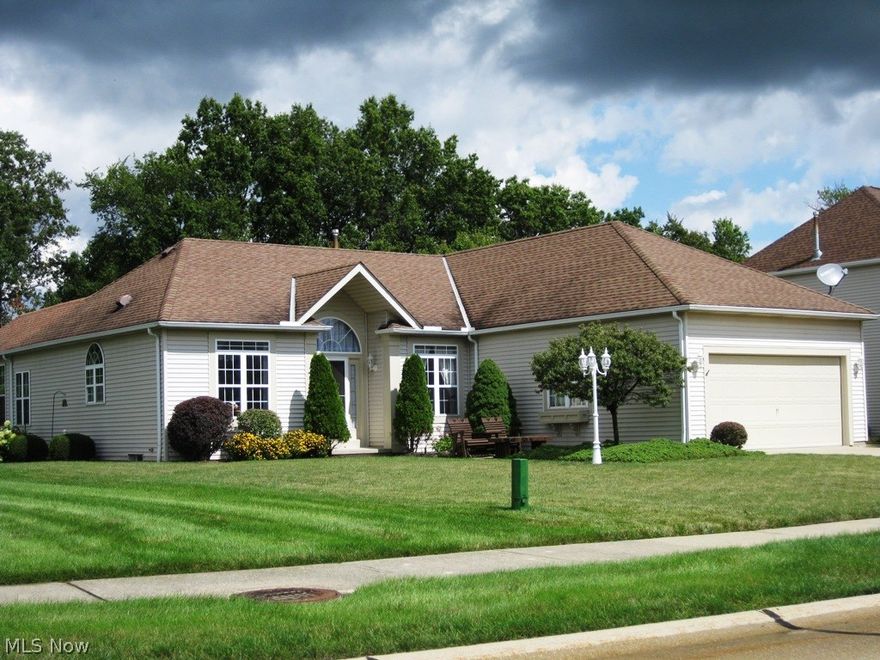 Beautifully landscaped and maintained ranch with great finished basement offering kitchen, wet bar, work room, hobby room & bath (pool table stays.) Enjoy the open feel when you enter the foyer with its hardwood floors that flows into the kitchen, offering great counter space. Great room & dining room flow together giving view to the fireplace & vaulted designer ceilings. A bright and cheerful sunroom off the dining room with outdoor access to patio & inviting backyard. Has newer furnace, A/C, water tank, plus much more. Original owner & shows pride of ownership. Third bedroom used as den. Bedroom closet was converted by builder to a larger hallway closet. Closet space can be potentially slipped back.