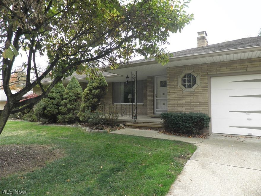 BACK ON MARKET. Spacious solid brick ranch! This meticulous home has been lovingly maintained and nicely updated. The inviting front porch welcomes you home. Enter into a large living room with picture window and wood burning fireplace. The living room flows into the dining room. The spacious kitchen features lots of cabinets, built in appliances, and newer flooring. The kitchen opens to the family room with sliding doors to the covered back porch. Gorgeous hardwood floors flow throughout the living room, dining room, hallway and bedrooms. The spacious master bedroom has ample closet space and a private updated bathroom with shower. A walk in cedar closet is located in the hallway by the master bedroom. There are two more spacious bedrooms and a completely updated main bathroom. The lower level features an enormous recreation room with a second wood burning fireplace and newer carpeting. The other half of the basement offers storage, a workroom with tons of built in cabinets, a laundry