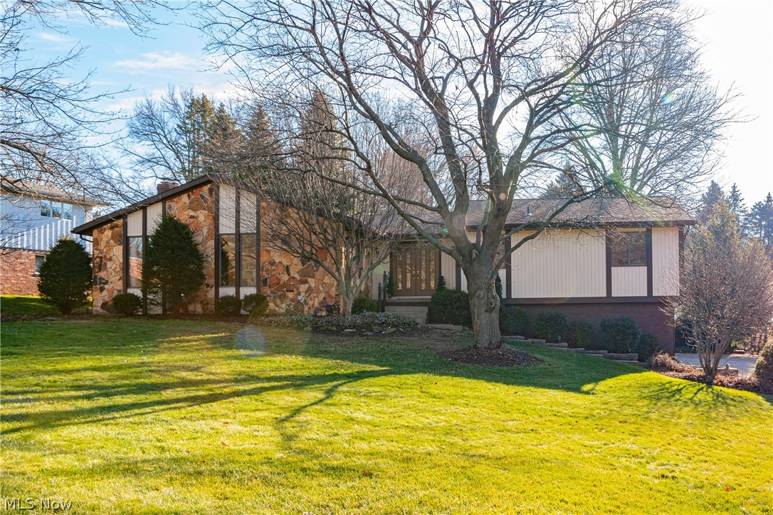Welcome home to this gem nestled in North Canton. The beautiful double door entry will lead you right into the large foyer. Upon entering the home you are greeted with a spacious and open feel. There is plenty of character with a nod to a mid-century modern style. The large great room boasts a gas fireplace. The bright and airy kitchen is complemented by a nice sized dining area. On the other side of this split floor plan you will find the primary suite along with 2 other nice sized bedrooms both including charming built-ins. A full size guest bath completes the main level. An extra wide staircase will lead you to an additional large family room with a gas fireplace, an extra bedroom, a third full bath, storage and the oversized, side load garage. It's not just the inside you will love. Outside you will have an easy time entertaining by the in-ground pool that was recently converted to salt water (2020). Lights strung above the deck make this back yard oasis a place you will never want to leave. If you would like to call this home, do not delay and schedule your private showing today!
