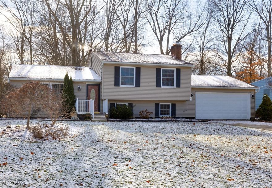 Come see this beautiful spacious split-level home with newly installed flooring, open concept floor plan, ample entertainment space on the lower level with a bathroom with access to the laundry area and garage. As you enter from the quaint front porch (added in 2023) into the open concept living space you will be able to take off your shoes sachet into the kitchen to grab a snack of choice, then head on down to the lower level where you can start the fire (new gas insert 2020) and relax after a long day. The kitchen has just the right amount of space with plenty of storage and work area. There is access to the fenced in backyard from both the kitchen and dining area. The backyard has a newly added firepit (2023), stone patio area, is spacious and perfect for outdoor activities. If you WFH, you will have 2 areas in the lower level to choose from to make your office space, here you will be away from the hustle and bustle of the home until you are ready to emerge. If you need space to do crafts or want a game room, you have the perfect area to create or relax doing what makes you happy. The upstairs bathroom received a complete makeover in 2019, and the master bedroom received new flooring in 2018. This home is conveniently located with access to stores, coffee shops, library, highway, schools and business.