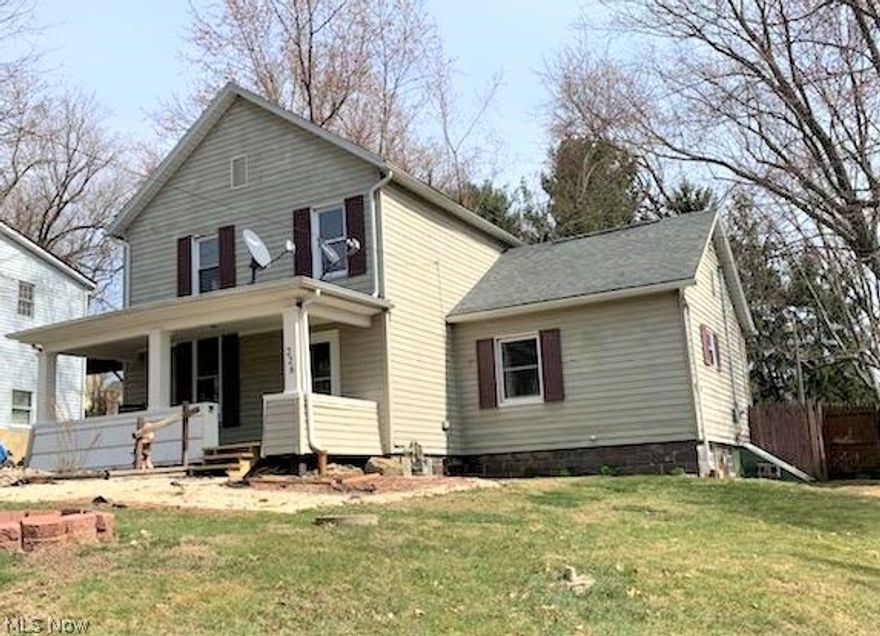 Absolutely nothing to do here but move in! Beautiful kitchen with stainless steel appliances, generously sized and updated rooms, decorative fireplace and wood columns dividing the dining room and the office, covered front porch for your evening relaxing and rear deck overlooking a large and level fenced backyard. Electrical box, gas furnace and water heater 2015. Union Local School District.