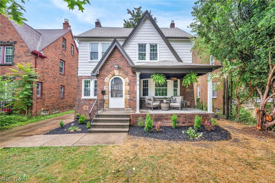 Welcome to 3561 Raymont Blvd.,University Heights, OH! This historic Tudor-style gem radiates timeless elegance while boasting modern updates that will take your breath away. With  4 spacious bedrooms and 2.5 beautifully remodeled bathrooms, this home is the perfect blend of classic charm and contemporary flair. Step into the brand-new kitchen, where culinary dreams come true! Featuring exquisite granite countertops, sleek ceramic tile flooring, shaker style cabinetry with added millwork and detailing and top-of-the-line new appliances.  This kitchen is designed for both style and functionality. The newly updated bathrooms are pure luxury, showcasing marble tile, subway surrounds, and chic new fixtures and faucets that elevate everyday living. Gleaming newly finished hardwood floors flow throughout the home, adding warmth and sophistication to every room. Imagine relaxing in the stunning front and second floor porches, a breath of fresh air and tranquility. A newly renovated 3rd floor provides an office, bedroom and ensuite bathroom.  The basement has also been renovated and adds even more stylish living space. This home also boasts NEW windows, ensuring energy efficiency and a flood of natural light. With a NEW forced air ducted heating and cooling system, hot water tank, and so much more, 3561 Raymont Blvd is as comfortable as it is beautiful. Just minutes from top-rated schools, parks, shopping, and dining. This home truly has it all! Don't miss out on the opportunity to own this incredible property. Schedule your private tour today and fall in love with the perfect blend of historic charm and modern convenience at 3561 Raymont Blvd!