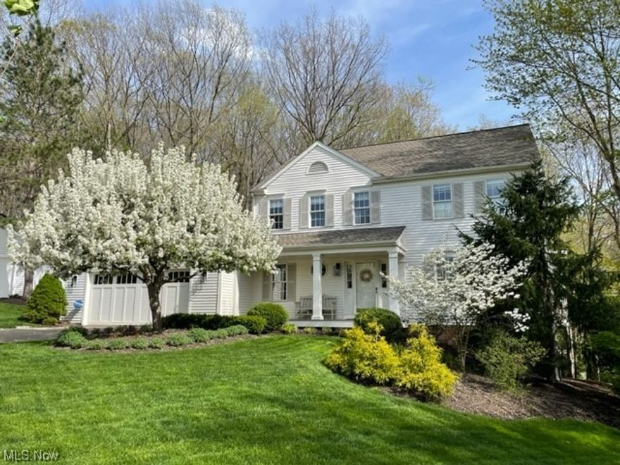 Remarkable & renovated Chagrin Falls charmer in most desirable Senlac Hills! Inviting front porch leads into the open entry w hardwood floors that continue into the living & dining rooms. Living room (optional home office) w built-in bookcases opens to the formal dining room w custom shutters on windows in both rooms. Step into the completely updated gourmet kitchen highlighted by spacious center island, custom wall to ceiling white cabinetry, designer lighting, stainless GE monogram appliances: commercial gas burner range, 2nd wall oven, microwave and dishwasher. Renovation included opening the spacious eating area to the grand size beamed ceiling family room w gas fireplace that leads to the fabulous sunroom finished in 2019 with mini split heat/AC, vaulted wood ceiling & special window system w built-in adjustable screens. Back hallway with built-in desk/workspace, CA coat closets leads to laundry room & unique double doored powder room that opens back to the front entry. 2nd floor