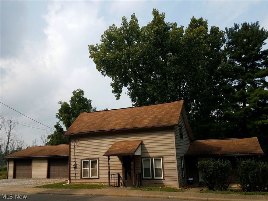 Remodeled home with a beautiful view! This 3 Bedroom home has been very nicely updated over the past two years. The first floor has a gorgeous Kitchen, spacious Dining Room, Living Room, Master Bedroom with walk-in closet, and a Full Bathroom with washer & dryer hookup. French Doors in the Dining Room lead to a large deck that overlooks a beautiful yard with mature trees and landscaping, and vacant land beyond. Two additional Bedrooms are located on the second floor. The over-sized two car Garage is just steps away from the house with plenty of room for projects, and an extra storage space off the back.