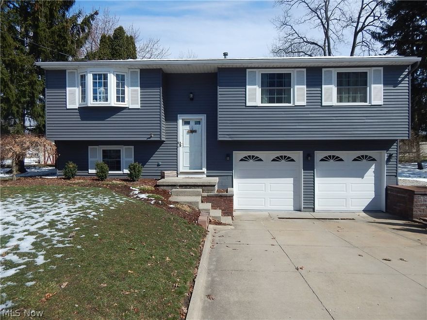 Check out this large bi-level house in Munroe Falls! This 3 bedroom and 2 full bathroom home offers many updates. Updates include: lighting fixtures, concrete counter tops in the kitchen, new furnace, new air conditioner, and a gas heater for the pool. The two-level deck, above groundf swimming pool, and fully fenced in backyard is an entertainer's dream. Additional storage space is offered with a large storage shed.  Located in Stow-Munroe Falls school district, close to multiple parks, and within 10 minutes to route 8! Call for a private showing.