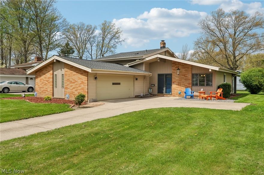 A well-maintained home in a wonderful neighborhood is just waiting for you. Welcome to this contemporary tri-level filled with natural sunlight that creates a bright and airy atmosphere throughout. The open floor plan offers a comfortable flow along with an abundance of storage space and closets.  The eat-in kitchen features ample cabinet and counter space, making it perfect for everyday living. The lower level includes a private workshop and a generously sized utility room, providing additional flexibility and storage options.  The two-car garage offers even more room for storage, while the sunroom provides the perfect extension of three-season living space to relax and enjoy your private, comfortable surroundings.  With just minor cosmetic updates, this house can become an amazing home for anyone with vision who is ready to make it their own.