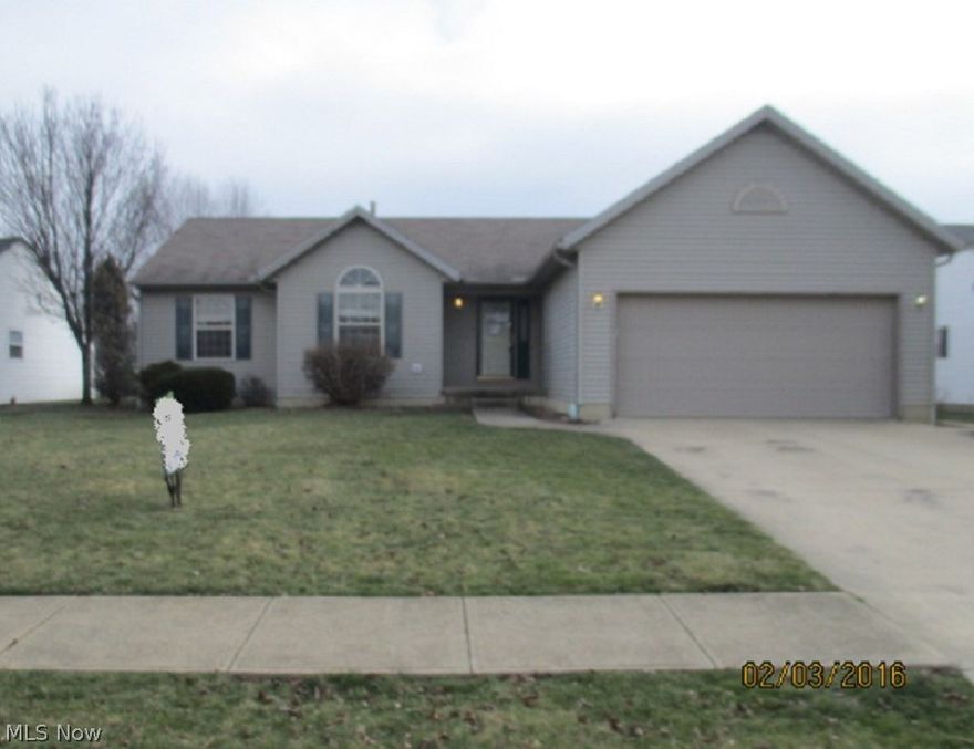 This is a HomePath property. This ranch style home in Elyria has it all! Open floor plan. Foyer entry. Vaulted ceilings in living room with brick fireplace. Dining area with glass sliders out to huge, custom wood deck in back yard. Light & bright kitchen has loads of counter space and casual breakfast bar. First floor laundry room off 2-car attached garage. Finished basement with oversized rec room, bar area and half bath. Great space for games and entertaining! Spacious bedrooms. Master with en suite bath. Great location, close to all. Don't miss this beauty!
