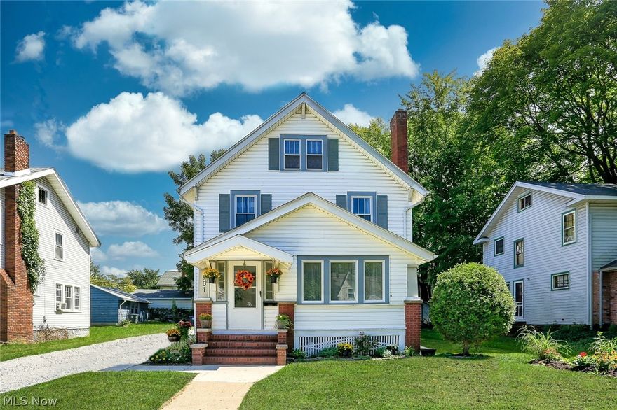 This lovely West Akron colonial has been updated from head to toe and boasts 4 bedrooms + a bonus room in the finished attic. Enter through the cozy enclosed front porch into a bright and open living space and formal dining area with a brick fireplace and original built-ins offering plenty of storage and charm. A brand new eat-in kitchen with granite, single-basin SS sink/SS appliances, shiplap backsplash and beautiful tile flooring connects to a half bath and onto the spacious 1st-floor Master bedroom. Upstairs is a stunning full bath with a tub/shower combo with glass surround, as well as 3 additional bedrooms. On the 3rd floor is the 2-room finished attic which could be a 5th bedroom/office/playroom. The clean and capacious basement has been painted and updated with a new electrical panel, furnace, and hot water tank. Step outside into a scenic wooded backyard with a brand new privacy fence and ample space for entertaining. The driveway was recently graded and finished with new ston