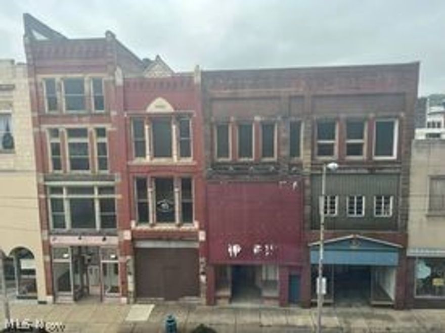 Income properties: 4 Street front units with multiple stories in downtown Steubenville. Unit 328- Finished office space, Corabi Building, GBA 2106 sq. ft.
Unit 330- Open unfinished space, Tom McCan Building, GBA 1,564 Sq. Ft.
Unit 332- Open unfinished space, Scott Building, GBA 1600 sq. Ft.
Unit 336- Open unfinished space, Phil-Mor Building, GBA 1,600 Sq. Ft.

Located in the growing area of Downtown Steubenville. Mixed use area; Retail, Offices & Commercial Property.
Total gross building area on main floor  is 6870 sq. ft.