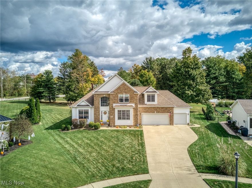 Welcome Home! 5217 Beckett Ridge...this one owner, custom built home combines thoughtful design & modern comfort and is located on a quiet cul-de-sac in one of Stow's most desirable neighborhoods...Bayside Lake! If you are looking for the perfect blend of space, comfort & style, this is THE ONE you have been waiting for! The open floor plan is enhanced by the 10-foot ceilings & abundant natural light! 2-story foyer welcomes you & leads to the spacious Great Room featuring soaring ceilings, bright windows & a cozy, gas fireplace. The inviting Kitchen features solid surface countertops, newer appliances, breakfast bar & a sunny eating area! Step outside through the sliding door and enjoy the private backyard with stamped concrete patio - perfect for relaxing or entertaining outdoors! The 1st floor Master Suite offers a peaceful retreat w/double tray ceiling, & a spa-like bath with dual sinks, jetted tub, step-in shower & walk-in closet. A private 1st floor office with French doors, formal Dining Room with window seat, convenient Powder Room, & a well-equipped Laundry Room (washer & dryer included) complete the main level. Upstairs, you will find 3 spacious bedrooms, oversized closets, and the main bath with double sinks, & a loft overlooking the Great Room - perfect for a reading nook or play area! Huge, unfinished basement offers abundant storage and endless potential for future living space and is already rough plumbed for a bath. 3 car garage! Freshly painted throughout with newer furnace & A/C (2023), this home is truly move-in ready. Enjoy neighborhood access to the Summit County Hike & Bike Trail. Just minutes to Route 8 & the Ohio Turnpike. Close to parks, shopping and dining!