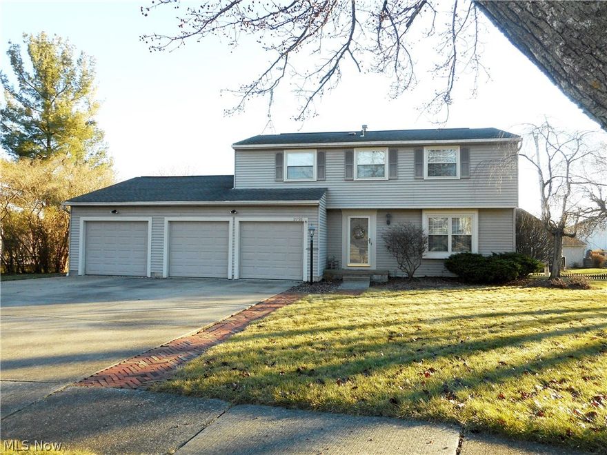 Make yourself at home in this spacious and meticulously maintained 4 bed/2.5 bath colonial!  A nice living room/dining room combination makes for easy gatherings for family and friends.  The applianced kitchen has ample work space and is open to the family room with sliders to the 3 season screened in porch/sunroom – there’s even a deck off the porch!  A powder room on the 1st floor offers convenience for you and your guests.  Upstairs the bedrooms are a good size and feature nice closet space.  The master has a 6 X 7 walk- in closet, a dressing area and a full bath with a walk-in shower.  In the main bath you'll find a new Rebath tub enclosure.  The 3+ car garage is amazing – the 3rd car space is actually a tandem area with room for a 4th vehicle, other toys or a nice workshop.  Plus, there is a gas line available to heat the garage!  Updates include new flooring in the kitchen, bath and foyer.  The sellers are offering a home warranty for peace of mind.  Discover this delightful home