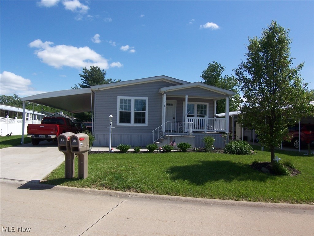 Welcome Home to the premier 55+ gated community of Twin Lakes. Newer 2019 Skyline Arlington Model Mobile Home offering a desirable open floor plan. Covered front porch with plenty of room for outdoor sitting. Spacious living room features plenty of windows, open to the kitchen/dining area. This kitchen will spoil the chef with loads of cabinet and counter space plus an island. All major appliances to remain which includes, stove, refrigerator, dishwasher, microwave, washer and dryer. Nice sized laundry room with storage. Spacious 3 bedrooms with 2 full baths. Master bedroom features a large walk in closet along with its own master bath. The storage shed in the backyard will remain. Backyard is partially fenced with privacy wood fencing. The attached carport with cement driveway is another excellent feature. The Twin Lakes Community has amenities such as a community center, tennis court, exercise room plus a variety of activities such as bingo, fishing, book club, potluck dinners, even a game & card night. Schedule your showing today! Don't miss out.