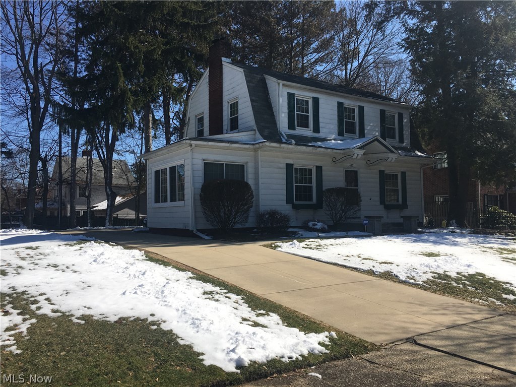 *Character and care throughout this comfortable family home * Includes an extra 60 x 114 side lot to easily view all summer activities from your peaceful sunroom * You will appreciate all the natural sunlight throughout this charming colonial * Large living room with wood-burning fireplace, crown molding, updated modern main full bath, sturdy built-ins and other good storage, updated vinyl tilt-in and casement windows, central air, 100 amp electrical box, extra concrete-patio area, and easy-care landscaping all located on a quiet dead-end street surrounded by other well-kept homes yet near major highways * Cheerful dining room, helpful breakfast far in the nice kitchen, and updated half bath handy to the back door * The finished recreation room is ready to appreciate * All windows treatments included * Immediate possession if desired * Extra peace of mind with a one-year home warranty by America's Preferred * Make new memories in this move-in ready home *