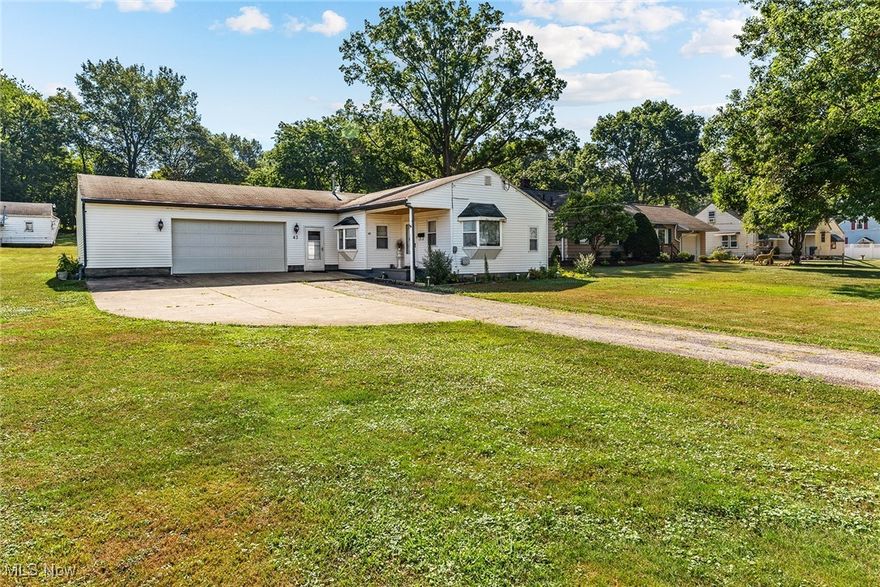 Welcome to this charming two bedroom with one full bath ranch in Barberton! This home has a living room full of natural light. The kitchen is bright, cheerful & has an eating area. There is a dining room centrally located in the home. There are also two bedrooms & a full bathroom with plenty of storage. Next to the kitchen is an additional living room. There is an utility room with laundry hook up. Attached to the house is a 2 car garage with a workshop room with-in. The yard is spacious & includes an outbuilding & a shed. Hurry and schedule your showing this home won't last! House is being sold AS-IS.