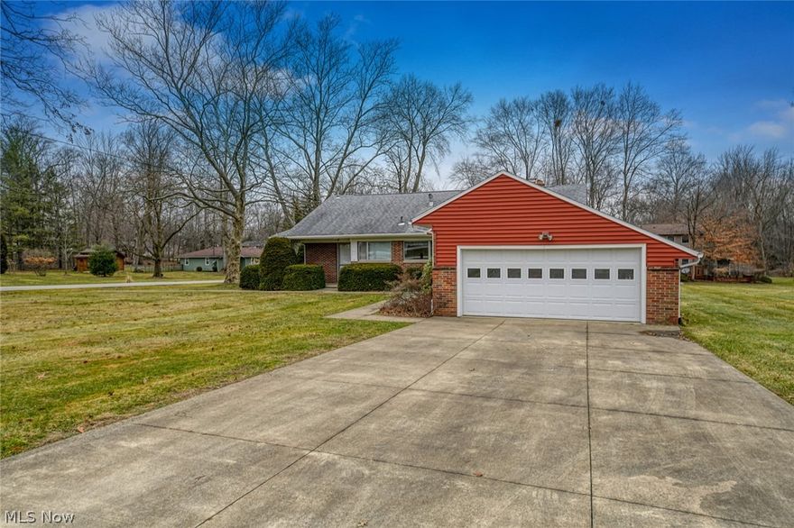 Don't miss your chance to check out this ranch in the desirable Tallmadge school district that is walking distance to MACA park! This beautiful brick ranch is situated on just over half an acre of flat land that is perfect to add a swing set or a pool. There is a partially covered patio that is a great spot for entertaining guests in the warmer months! Walk in the home to find a large eat-in kitchen with plenty of countertop space and cabinets for storage. There is a large half bath just off the kitchen. The dining room and living room have large windows that provide lots of natural light. There are gorgeous built-ins in the living room that are perfect for extra storage and a wood burning fireplace! Down the hall are 3 large bedrooms and a large full bathroom. The first bedroom has real hardwood, a nice reading nook and a large closet. The second bedroom is also large with carpet but has real hardwood underneath. The master bedroom has 2 closets, hardwood under the carpet and large wi