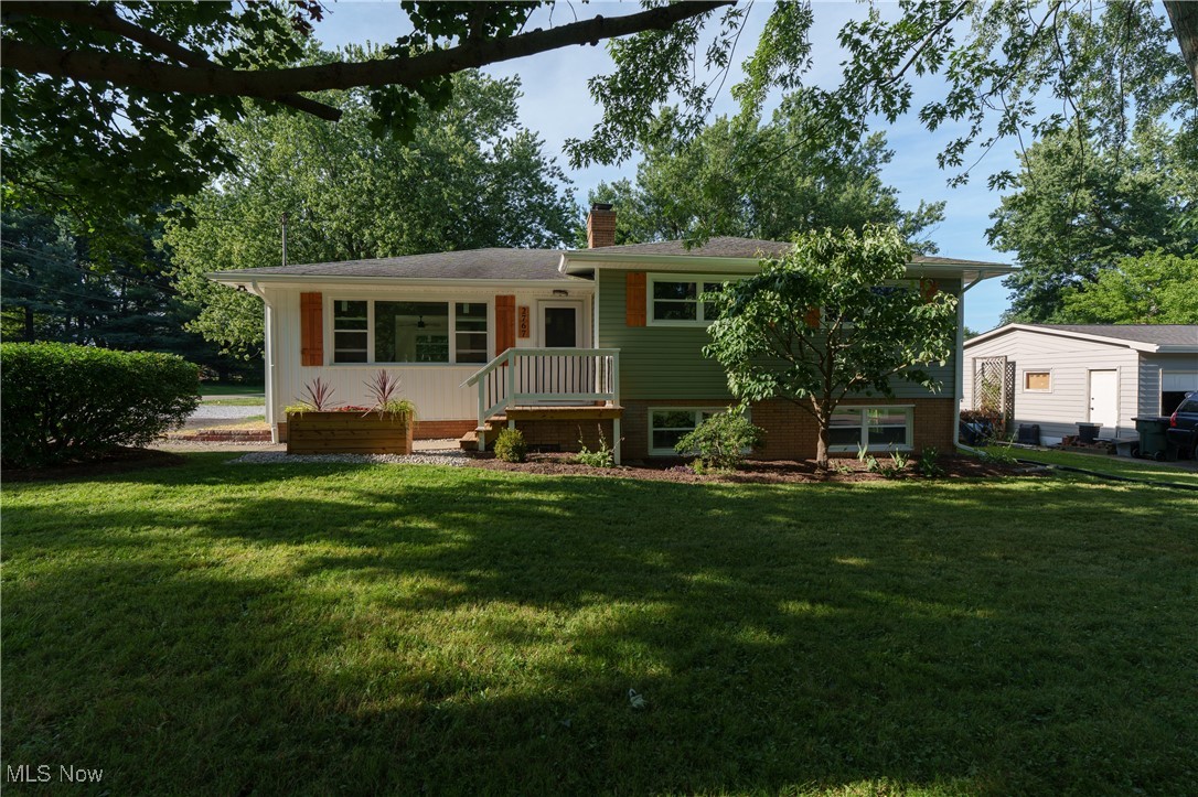 Welcome to 2767 Brouse St. NW, a stunning 4-bedroom, 2-bathroom home offering over 1,800 sq. ft. of completely renovated living space in the highly sought-after North Canton City School District. Every inch of this home has been thoughtfully updated, blending modern finishes with timeless comfort. Step into the heart of the home – a gorgeous kitchen featuring granite countertops, stainless steel appliances, a stylish tile backsplash, and a massive center island with bar seating perfect for entertaining or everyday meals. Luxury vinyl plank flooring flows seamlessly throughout the home, adding durability and contemporary style. The spacious family room showcases a beautiful stone fireplace and offers an abundance of extra living space. Each of the three bedrooms is generously sized, and both full bathrooms have been tastefully remodeled—one with a fully tiled shower, updated vanity, toilet, and flooring, and the other featuring fresh tile, wainscoting, and a brand-new vanity. Exterior upgrades include brand new siding and newer windows, giving this home excellent curb appeal and energy efficiency. Located in peaceful Lake Township with unbeatable proximity to shopping, dining, and commuter routes, this home truly has it all. Don’t miss your chance to own this move-in-ready gem in a prime location!