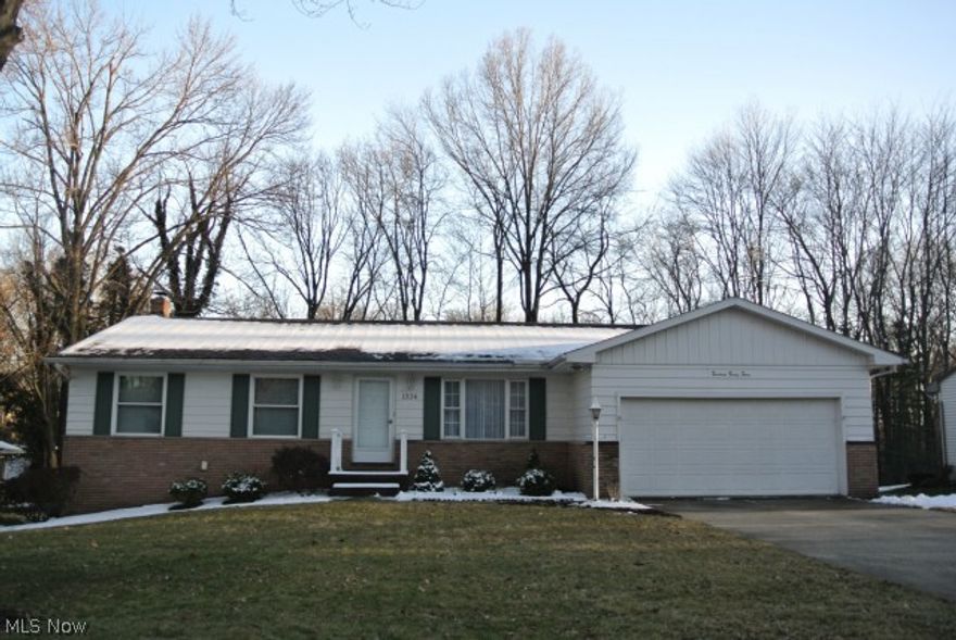 Absolutely Immaculate! 1-owner home Ranch with a gorgeous view of the ravine woods to stream! Total Beauty! 3 bedrooms, 2 1/2 bath, family room, eat-in kitchen, formal dining room. 2 car attached garage.  Walk-out basement. The basement is 3/4 finished-just needs carpet.  Glass block windows lots of updates *dates are approx. 2006 Kitchen completely remodeled with newer oak cabinets, flooring, counter tops, stove, refrigerator & dishwasher. Replaced windows, furn & A/C 2006, roof 2003 (tear off), gutters 2003, garage door 1994 spring.  Insulated garage & attic 2000. *Note only 2 windows not replaced.