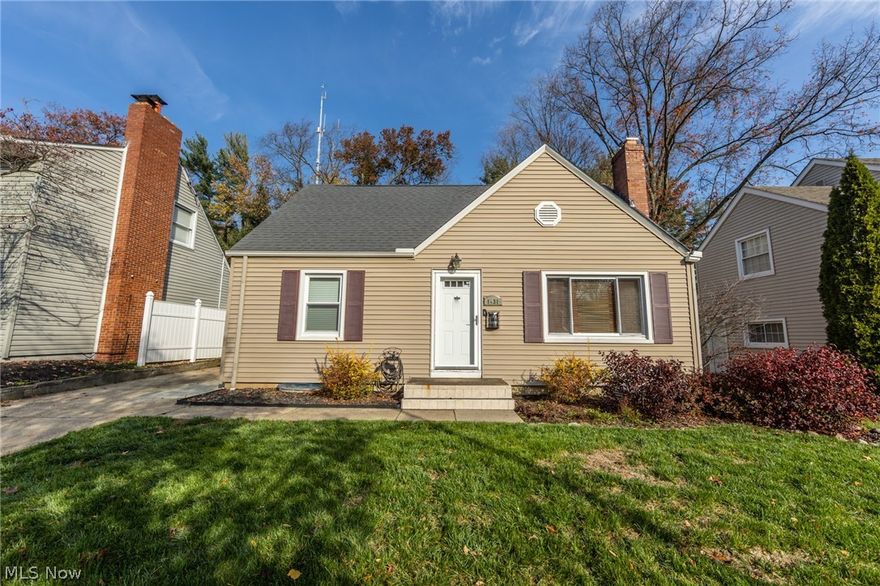 A darling Cape Cod in Cuyahoga Falls! Close to all the Portage Crossing shops and restaurants! The living room has a charming wood burning fireplace, hardwood floors and large windows to allow the natural light to shine in. Attached is the living room is dining area or kids play area. Into the oversized kitchen which boasts a ton of cupboard space for storage,  and a huge window to enjoy coffee and look out into your backyard. Two nicely sized bedrooms on the main floor, one currently being used as a home gym, as well as, a nicely updated bathroom. The upstairs includes two more bedrooms, including the master bedroom with an en suite. In the finished lower level, you will find a very nice bar, this area will make the perfect spot for entertaining. Also do not miss out on the three season room in the back where you could sit and enjoy your huge backyard. Other updates include: water proofed basement, newer roof, vinyl windows.