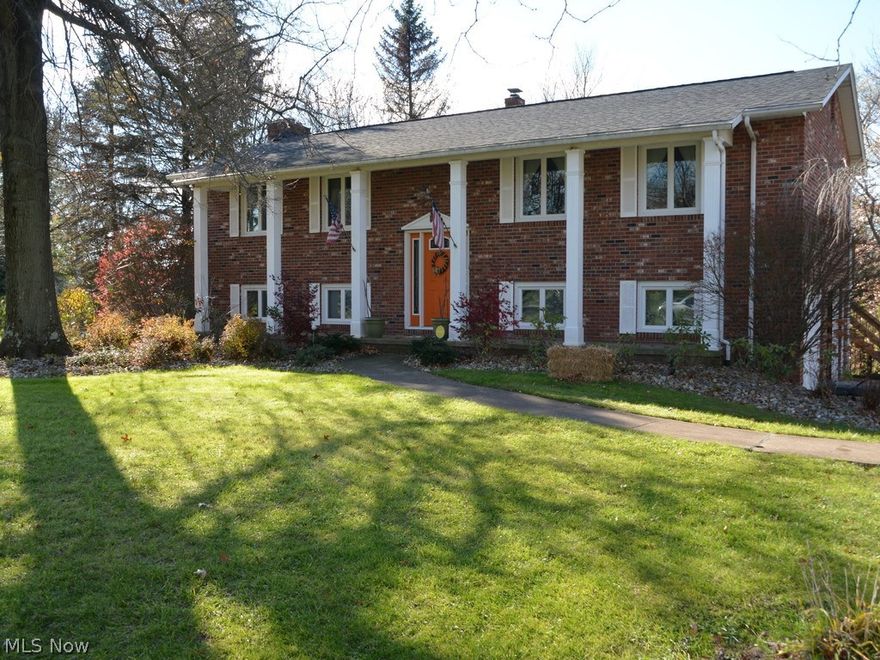 Agent Owned. *Charming brick home on almost 4 acres of land in North Canton.* *Close enough for the convenience of the city but with the pleasure of country living.* * *Total of four bedrooms with a bonus room* *This property has it's very own lighted bridge with electric.* *It also has a pond with a dock and retaining wall; the pond is fully stocked.* *Barn has been used as a 3 car garage for a total of 5 car garage available on this property with its own separate drive entrance and attic.* *Kitchen has all stainless steel appliances, granite counter tops and beautiful back splash.* *All three bathrooms were updated 2014.* *Dock replaced 2015* Retaining wall on pond replaced 2013 with barn stone** *Windows, front door and back door updated 2012* *Heat source updated 2015* *Hot water tank 2015*. *Roof was replaced in 2012.* *Fresh paint throughout.* *Kitchen remodeled 2013* *Septic replaced 2013*. *Well tank replaced 2015*. *Carpet and flooring replaced in 2013* *Barn roof partially re