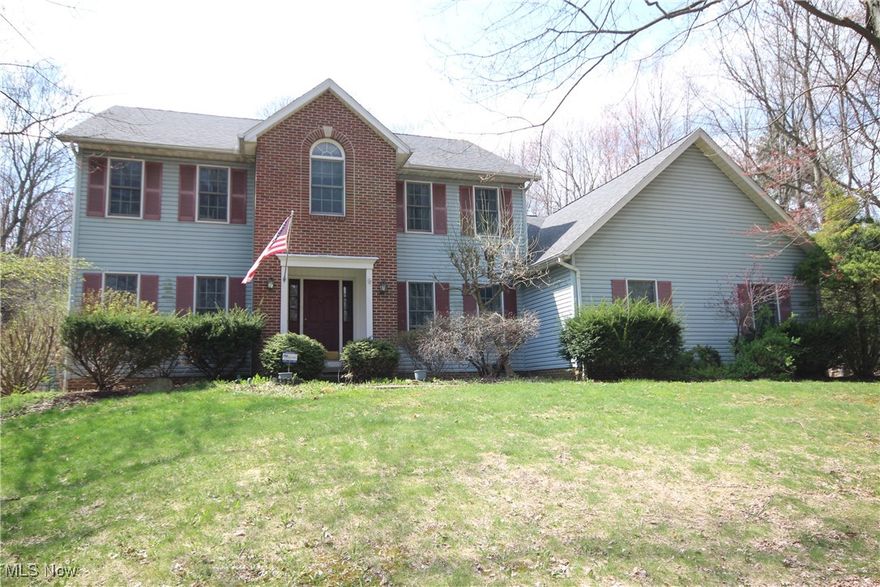 Welcome to 2660 South Medina Line Rd., a truly special property located in the desirable Sharon Township and served by the highly acclaimed Highland Local School District. This beautiful home sits on 2.15 acres of treed land and offers a rare combination of privacy, accessibility, and space. One of the standout features is the 768 sq ft ADA-compliant in-law suite, complete with a private ramped entrance, full bathroom, kitchenette, and a large closet/storage area with its own laundry hookup—perfect for extended family, guests, or assisted living needs. The main living area boasts a spacious eat-in kitchen with a large island, ample cabinetry, large pantry, and appliances. It flows into the warm and inviting family room, where a dual-function fireplace (gas/wood) anchors the space. Included in this room is a custom-made corner unit that accommodates a sixty-inch flat screen TV. The first floor also has a formal living room (used as a library) and dining room (used as an office). The large owner’s suite offers a peaceful retreat with an en-suite bath featuring a jetted soaking tub, separate shower, and a walk-in closet. The mostly finished basement adds valuable living space with a large recreation room, plumbing for a wet bar, and a rough-in for a half bath, making it ideal for entertaining, hobbies, or a future home theater. There is plenty of storage space as well. The home features a 3-car side-load garage providing abundant storage and workspace. Outdoors, the property shines with a private fire pit area perfect for gatherings, a shed for additional storage, and two fully fenced garden spaces ready for planting. Surrounded by mature trees and natural beauty, this home offers a peaceful, rural feel while still being close to shopping, dining, and major routes. With over two acres, in-law accommodations, finished lower level, and comforts throughout, this home is must-see. Do not miss your chance to own this rare gem—schedule your private tour today!