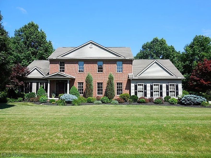 You'll be sold the instant you see this prestigious well cared for 4 bedroom 3 bath colonial home that offers a spacious 2 story foyer that is open and over looks the fire placed great room. The dinning room puts graciousness back into entertaining. The decorators dream eat-in fire placed kitchen makes cooking a pleasure. This kitchen offers granite counter tops, stainless steel appliances as well as a double oven, pantry and plenty of storage. The sunroom is located off the kitchen and over looks the spacious backyard, deck and large brick patio and fire pit. The first floor owners suite is worthy of it's name Enjoy the two large walk in closets, separate vanities, glass block walk in shower and wonderful jet tub. The second floor bedrooms are spacious and offers plenty of closet space. The beautiful hardwood floors through out the home will simply amaze you. Please put this on your A list of homes to preview.