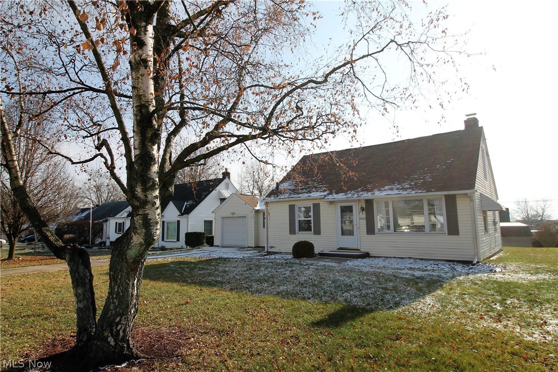 Welcome home to this charming, remodeled three-bedroom, two full bath Bungalow. Freshly painted throughout, newer LVP flooring. There is a large living room, dining room and kitchen. The bright, fabulous eat in kitchen offers double sink, plenty of cabinets, stove and refrigerator. There is a first-floor bedroom with a ceiling fan or could be an office etc. The beautiful full bathroom has been remodeled. Upstairs there are two more bedrooms. Basement is unfinished but has room for storage and has full bathroom, laundry area. Large backyard offering a patio for entertaining or just sitting out relaxing. All you have to do is move in!