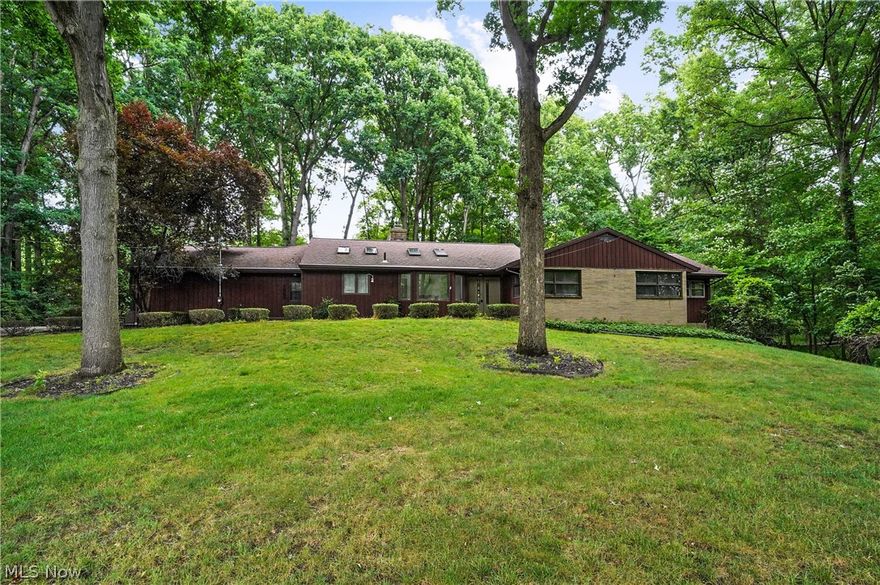 Welcome to 1525 Woodland Ln, a stunning ranch home located in the serene community of Silver Lake. This spacious 4-bedroom, 4-bathroom residence offers 2,971 square feet of first-floor living space, complemented by an additional 1,640 square feet of finished living area in the walk-out basement. Situated on a picturesque 2-acre wooded lot at the end of a quiet dead-end street, this property provides the perfect blend of privacy and convenience. Step inside to discover an inviting living room featuring vaulted ceilings and a cozy fireplace, perfect for gatherings and relaxation. The updated kitchen boasts granite countertops, sleek black appliances, and ample cabinetry. Enjoy meals in the private dining area or take them outside to the large back deck, where you can soak in the natural beauty of the surrounding woods. The spacious master suite offers a walk-in closet and a master bathroom, providing a private retreat at the end of the day. The walk-out basement provides even more living space, ideal for a recreation room, home office, or gym. The three-car garage offers extra storage and parking options. Experience this beautiful home that offers modern amenities in a peaceful, wooded setting. Schedule a tour today to see all that 1525 Woodland Ln has to offer!