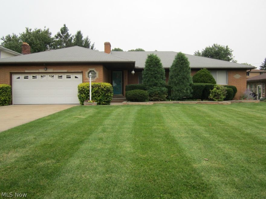 Brooklyn Hts. ranch in a beautiful area of homes! This brick ranch has 3 bedrms., including a large master bedroom. There are 3 fireplaces in the home, in the living, family and recreation rooms.  The bright, airy kitchen is off the Family Rm. and Dining Rm.  Covered back raised patio.  Gorgeous yard.  Hardwood floors under the carpeting. Huge recreation room and bar, plus a work room, laundry room and more!   Cuyahoga Hts. Schools !   Walk to the community park!