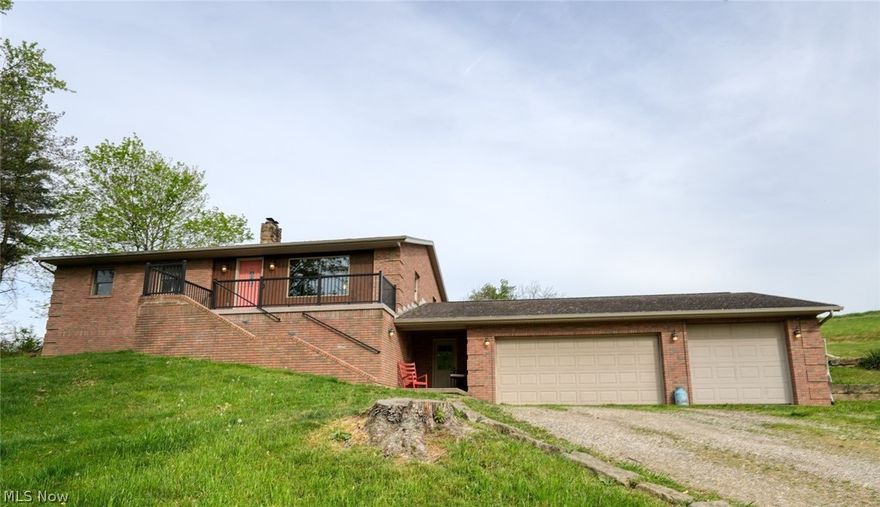 Escape to your own private oasis with this scenic 5.5 acre property offering unparalleled tranquility. The charming 4-bedroom, 2-bath home has a beautiful kitchen featuring a central island, sleek stainless-steel appliances, and ample counter space for meal preparation. The spacious living room has abundant natural light with windows on three sides, The partially finished basement includes the 4th bedroom, a full bath, and a cozy family room. Experience year-round comfort with geothermal heating and cooling. You will appreciate the convenience of the 3-car attached garage, plus a large 48' x 60' pole barn for storing equipment, vehicles, or using for farm or 4-H animals. This property offers an unparalleled opportunity to embrace the beauty of rural living while enjoying modern amenities and privacy. Did I mention the mature Apple & Pear trees and the potential trophy bucks right outside your door and only minutes to Salt Fork lake in East Guernsey School District. Motivated Seller.