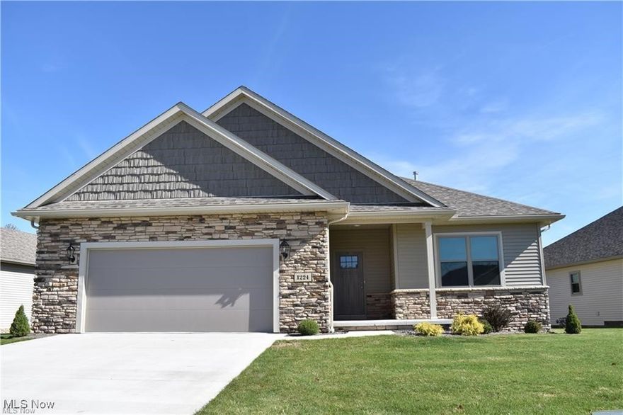 Immaculate condo! Single Unit, Quality through-out! Features Schrock cabinets, granite and quartz countertops. 1st floor laundry, large master suite that has private bath and walk in closet, eat in kitchen has an island, and plenty of cabinets. Basement walls are poured, and an oversized garage. Subject to seller finding suitable housing.