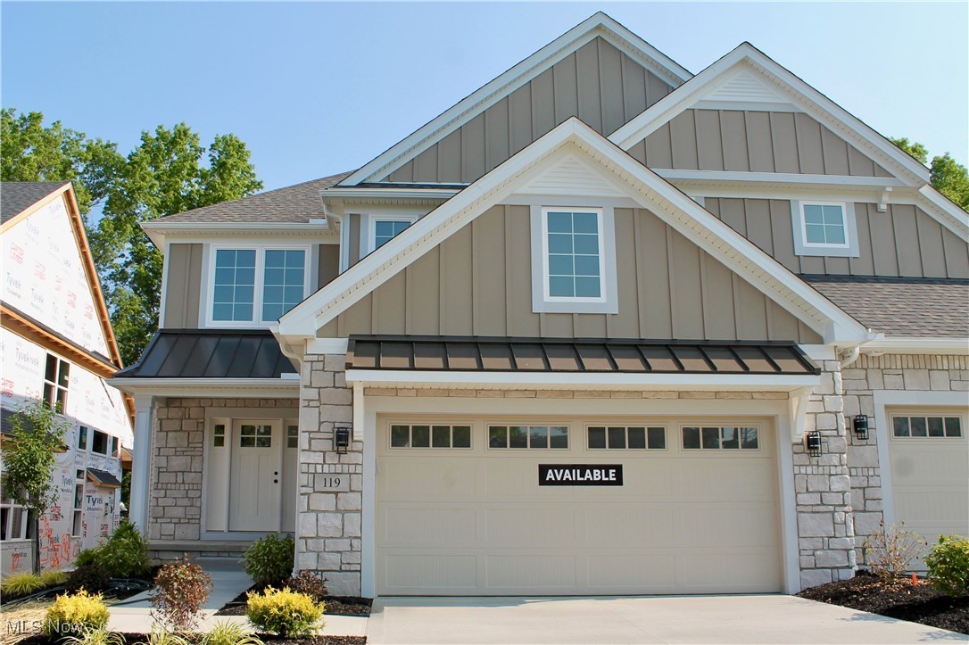 Beautiful new Stoneridge plan with 1st-floor primary suite available for a Spring 2025 move-in in the Brecksville/Broadview Heights school district! This brand-new open-concept villa features a 2-car garage, a full basement roughed in for a future bath, and a rear-covered composite deck with wooded views! Tasteful upgrades include luxury vinyl plank flooring, wrought iron spindles to the 2nd floor, custom cabinetry, black matte plumbing fixtures, and upgraded appliances. This well-designed plan showcases a covered entryway, a large eat-in kitchen with an accompanying dining space, and a 2-story Great room with floor-to-ceiling windows and gas fireplace. You will also find an open and airy 1st-floor primary suite that features a glass door that opens to the back covered deck. Retreat to the owner's bath with dual sinks, quartz counters, luxury vinyl plank flooring, a huge walk-in closet, and a tile shower. The oversized mudroom, powder room, and laundry room complete the 1st floor. Upstairs, you'll find an almost 200 square foot loft, and 2 additional bedrooms, each with their own walk-in closets and shared full bath. The full basement offers ample storage or flexibility for future finishing! Just 1.5 miles from I-77, 25 minutes from downtown Cleveland, and walking distance to shops, restaurants, and the community recreation center. Pictures are for illustrative purposes only as features and finishes may vary from actual.