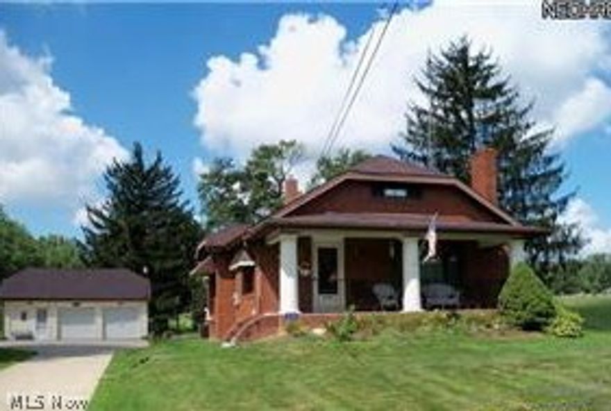 3 bedroom 2 bath home with 2 fireplaces, 2 outbuildings & 2 1/2 car garage.  Larger than it looks!