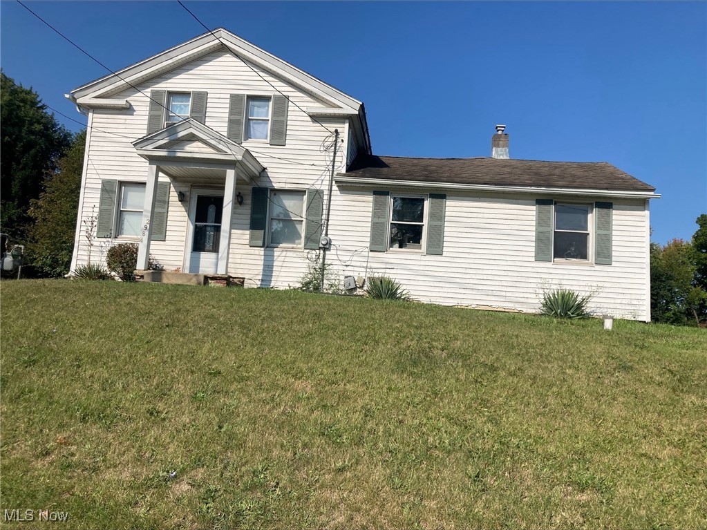each apartment has one bedroom with kitchen, bath, living room and bed. Garage was converted to a store front which is blocked. Three furnaces. 3 apartment investment for $700. One electric meter and one gas meter