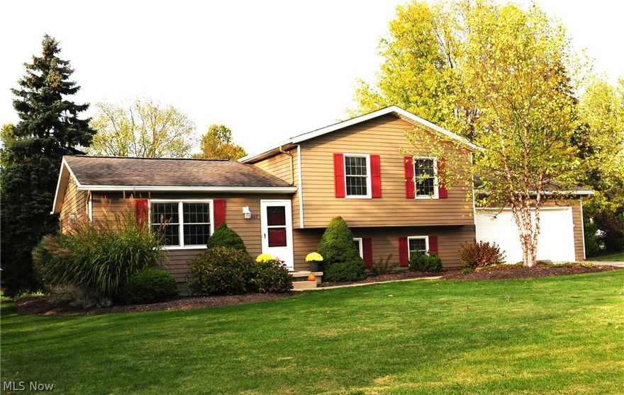 This stunning 3 bedroom Split level in Hudson school district is absolutely beautiful. You can easily see the true pride in ownership in this completely updated home. New Carpet throughout in 2018. Both bathrooms in the house are remodeled and the upstairs has a tiled walk in shower. In the living room there is a vaulted ceiling and the stone fireplace stretches from floor to ceiling. The mantle has two electric outlets hidden on top for decorating for the holidays. The kitchen has new solid wood cabinets that feature slow close drawers and dovetail joints along with quartz countertops. Kitchen also has stainless steel appliances, below cabinet lighting and a raised wine rack. Downstairs is a large family room with a built in surround sound system with Bowers and Wilkes Speakers and a Denon Receiver. Owner is also including a wall mounted 47 inch flat screen TV!!! Outside is a gardeners paradise as you can see from the pictures. The current homeowners are very meticulous and have done