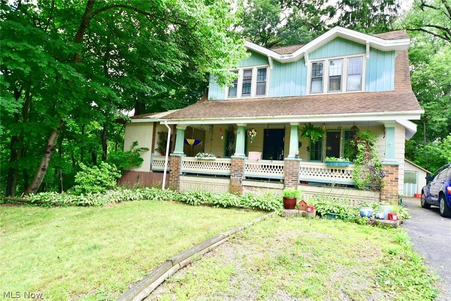 Fabulous low traffic street with beautiful views of Mill Creek Park.  Welcoming expansive front porch makes for a perfect spot to enjoy your morning coffee.  Inside, you will appreciate the spacious living room with fireplace, awesome dining space and kitchen with updated cabinets.  Three generously sized bedrooms and full bath on the second floor.  There is an added bonus feature of a enclosed porch which can suite many potential purposes.  Charm and character throughout.  This is a must see.