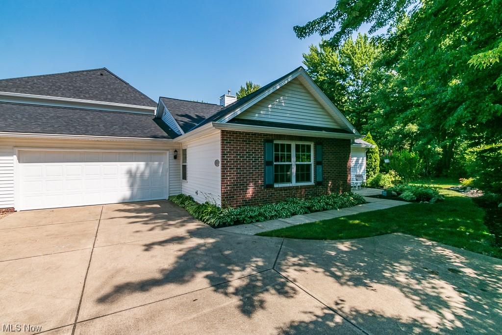First floor living with an open floor plan! Welcome home to this 3 bedroom, 2 full bath ranch condo in Marsh Landing! Spacious vaulted living room with plenty of natural light, offers a decorative corner gas fireplace and a slider for easy access to the outdoor patio. The kitchen with all appliances and plenty of storage, is open to the dining area and family room. The large master en-suite has a double closet and an attached full bath. There is also two additional nice-sized bedrooms, both with double closets, and another full bath. Laundry room has a large closet, shelving and utility sink. Two car attached garage with attic access. The wooded outdoor space is private with two patios. Move-in ready!