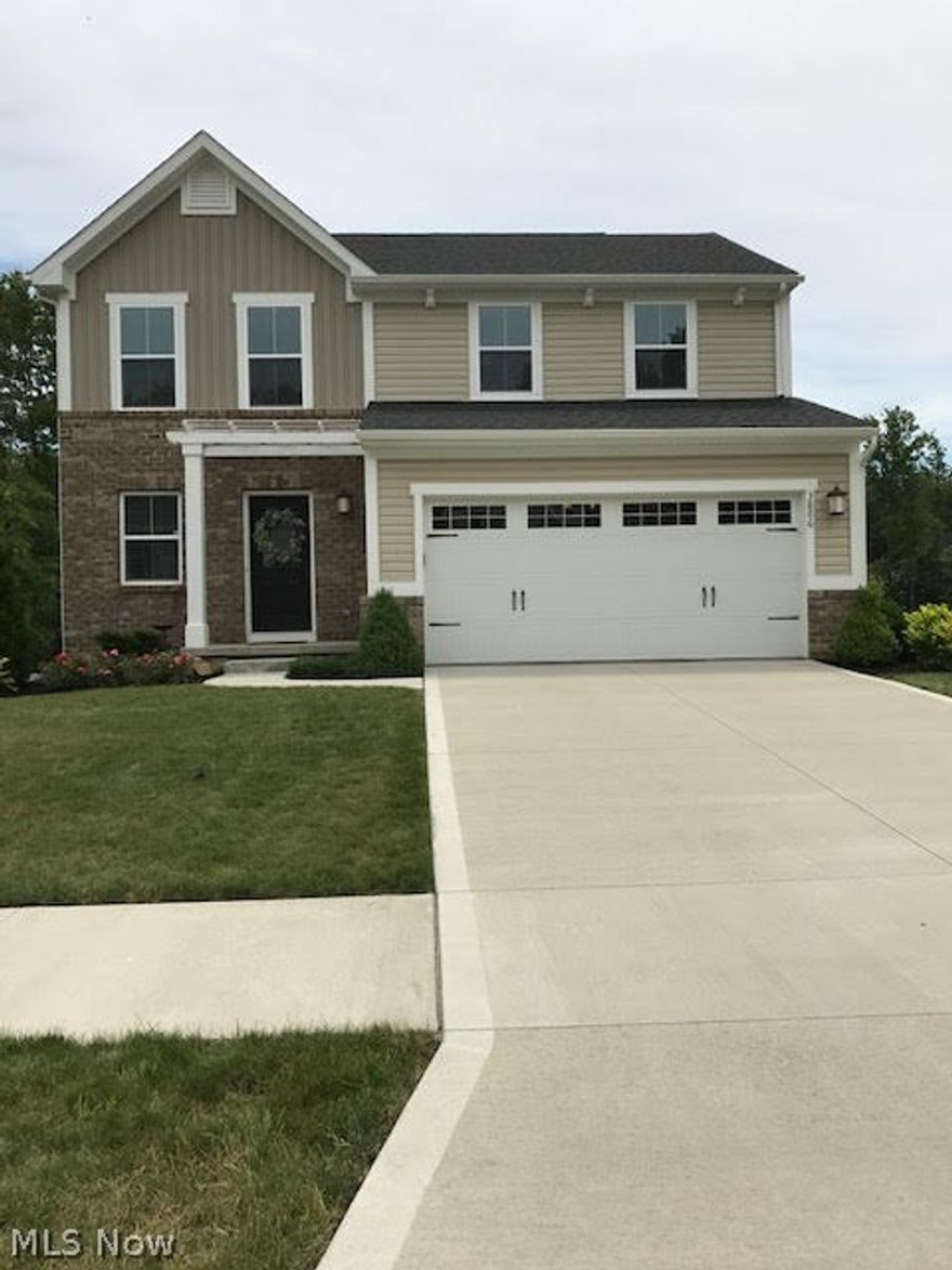 Move in ready in one of the nicest neighborhoods in Brimfield. This clean, beautiful colonial looks brand new. Shoes have never been on this carpet. Master bedroom has attached full bath along with walk in closet. Another full bath upstairs on second floor and powder room on first floor. Rough ins for a bathroom in the finished basement.   The living room features a fireplace. Super nice kitchen with island. Dining room has sliding door to cute back patio with a beautiful view. The homeowners association owns the back footage and will never be built on. Attached 2 car garage and a finished family room downstairs. Lots of storage with egress window in the that area.