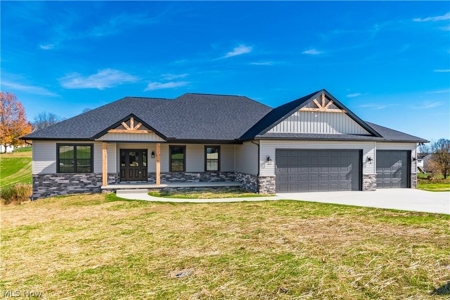 Check out this custom home built by Schlabach Builders. Just completed in October of 2022. Very open floor plan. Amazing custom kitchen by Schrocks with brand new appliances and of course the wine fridge. Nestle next to the custom fireplace. The Master Suite offers an amazing custom bathroom and also a door leading to the deck. The deck has been double supported so you can add the hot tub (already wired for one) right outside your bedroom. 3 bedrooms and 2.5 baths on the main floor.  Downstairs you will find a finished walk out basement. Loads of windows and light with an expansive patio. 2 more bedrooms and a full bath in the lower level. You will also find a sprawling family room which would be a great place to entertain. The gym area has custom bluetooth lights with speakers. This home is a custom built home with multiple upgrades. Custom lighting throughout. Security system. Laundry on first floor with custom built cubbies for the littles. All appliances are brand new, never used,