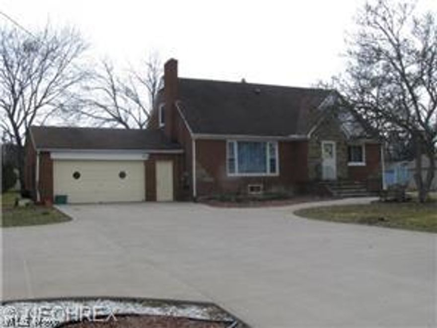 Septic System needs replaced per Summit County. This will be a Short sale.  Large 4 bedroom  2.5 brick cape sitting on over 3 acres.  Large rooms throughout. Needs some cosmetics.  A lot of potential.  Newer concrete drive. Hardwood floors. WBFP in living room and basement.  Basement has been waterproofed. Updates: furnace, A/C, most windows.