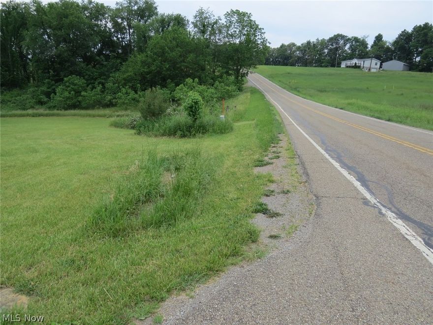 30.6 Acres of Hunting/ Recreation Land in Carroll Co. This property is approx. 25 acres of woods with spring water, trails, possible lake sites, etc. An old house structure and 26x28 garage are located on the property along with a septic that has passed Carroll County inspection. There's also a large camper and some bldg. materials here that are negotiable with property. Gas and oil does not transfer. Call to view!