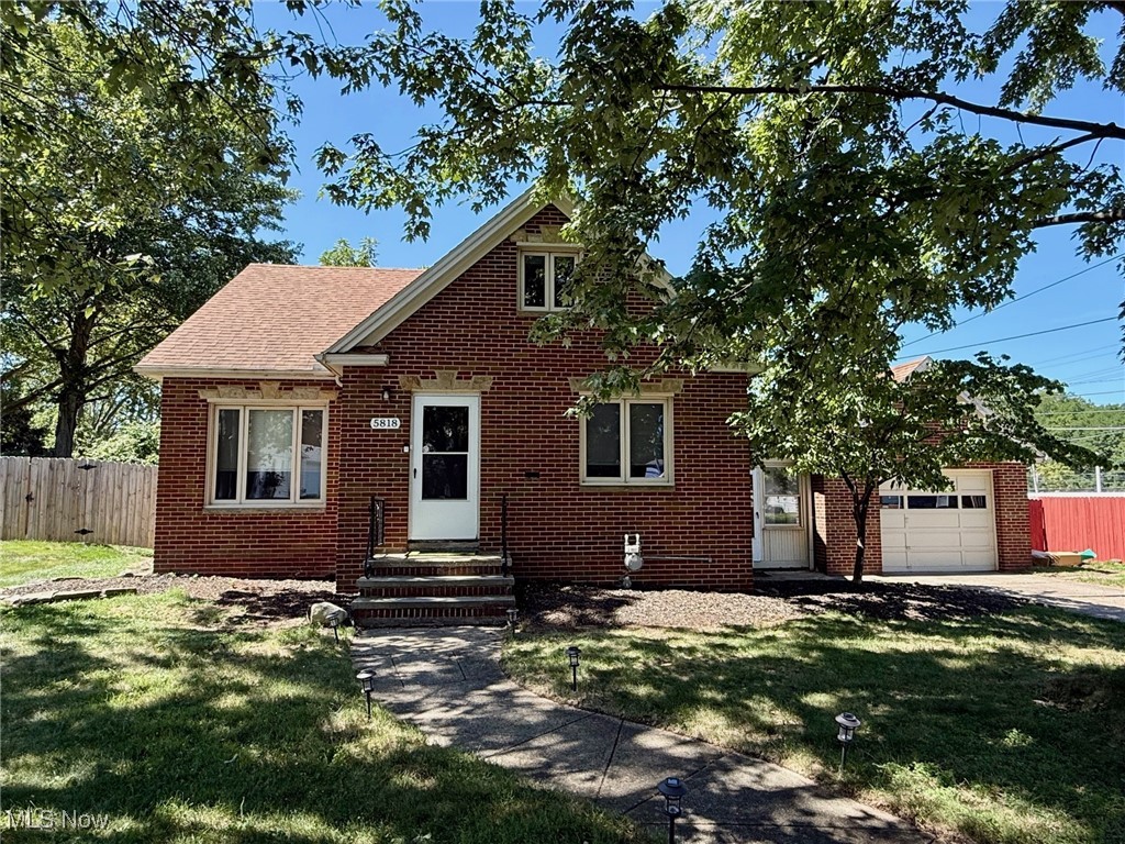 5818 Chestnut Hills Drive is a charming, move in ready full brick Cape Cod in Parma! Step into a spacious living room, filled with natural light from a large picture window and new flooring found throughout. The updated eat-in kitchen boasts stainless steel appliances, new white cabinetry, granite countertops, and stylish subway tile backsplash. The first floor includes two comfortable bedrooms, a nice full bathroom, and a convenient mud room leading to the attached 1 car garage. Upstairs, you'll find a large third bedroom offering ample privacy. The fully finished basement is ideal for entertaining, complete with a bar, recreation room, full bathroom, laundry area, and plenty of storage. Outside, enjoy the privacy of a fenced backyard with a sprawling deck perfect for gatherings, as well as a cozy firepit. Located near the Metroparks, shopping, schools & quick highway access. A wonderful place to call home.