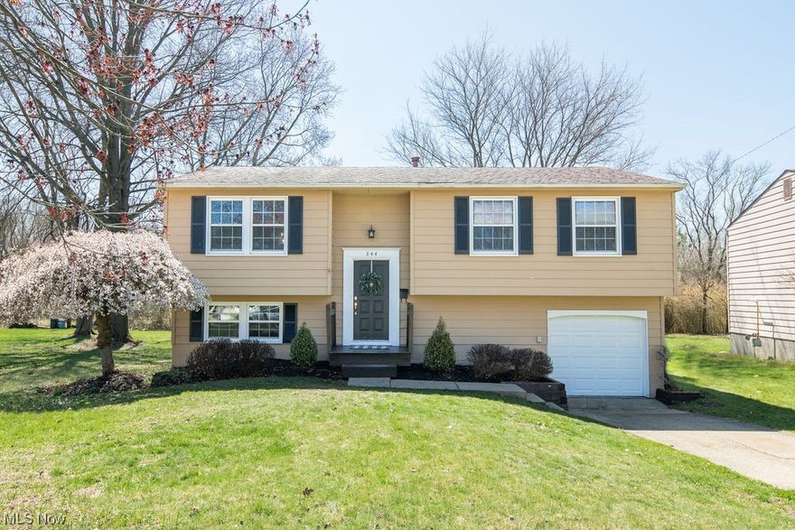 Welcome to this beautifully updated, move in ready bi-level home!  Upon entering, you will be greeted with stairs to the first floor, which have been updated with waterproof, luxury vinyl plank flooring throughout.  The open concept kitchen, dinning and living room make this level perfect for entertaining.  The kitchen has been updated with beautiful new butcher block countertops, backsplash and sink faucet.  Access to the large, private deck is also through the kitchen.  Three of the four bedrooms are located on the first floor, along with a full bathroom.  The lower level boasts a generous fourth bedroom and full bathroom.  There is also an additional living space and all carpet on the lower level has been recently cleaned.  The laundry room has an added bonus area with built in bookshelves and access to the garage.  Access to the lower deck/patio is also through the laundry room.  The back yard is a fantastic size and private oasis with two outdoor living spaces to enjoy.     

So